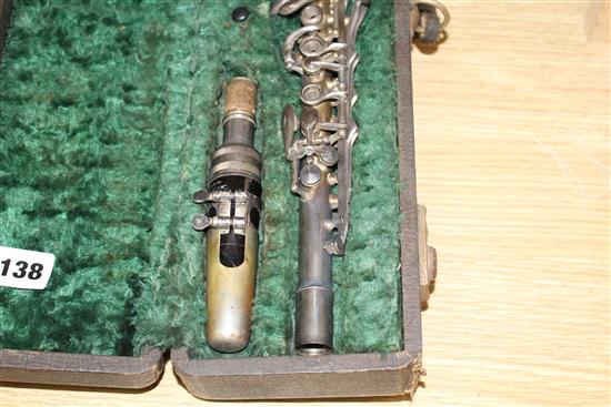 A Gladiator silver plated clarinet, cased